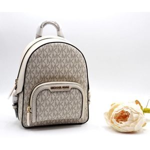 NWT Michael Kors Jaycee extra small - light cream color